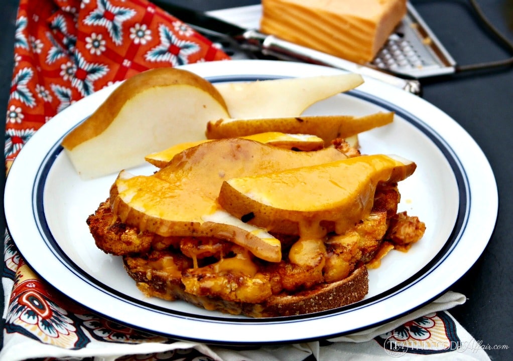 Open Faced Cauliflower Cheddar Melt with slices of pears and honey mustard! This hearty and satisfy vegetarian sandwich is a great meatless Monday meal! The Foodie Affair 