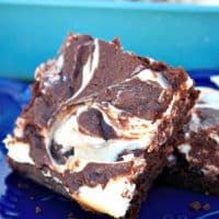 Low Carb Cheesecake Brownies are a delicious guiltless treat! These gluten free and low sugar brownies brings together two desserts in one! The Foodie Affair