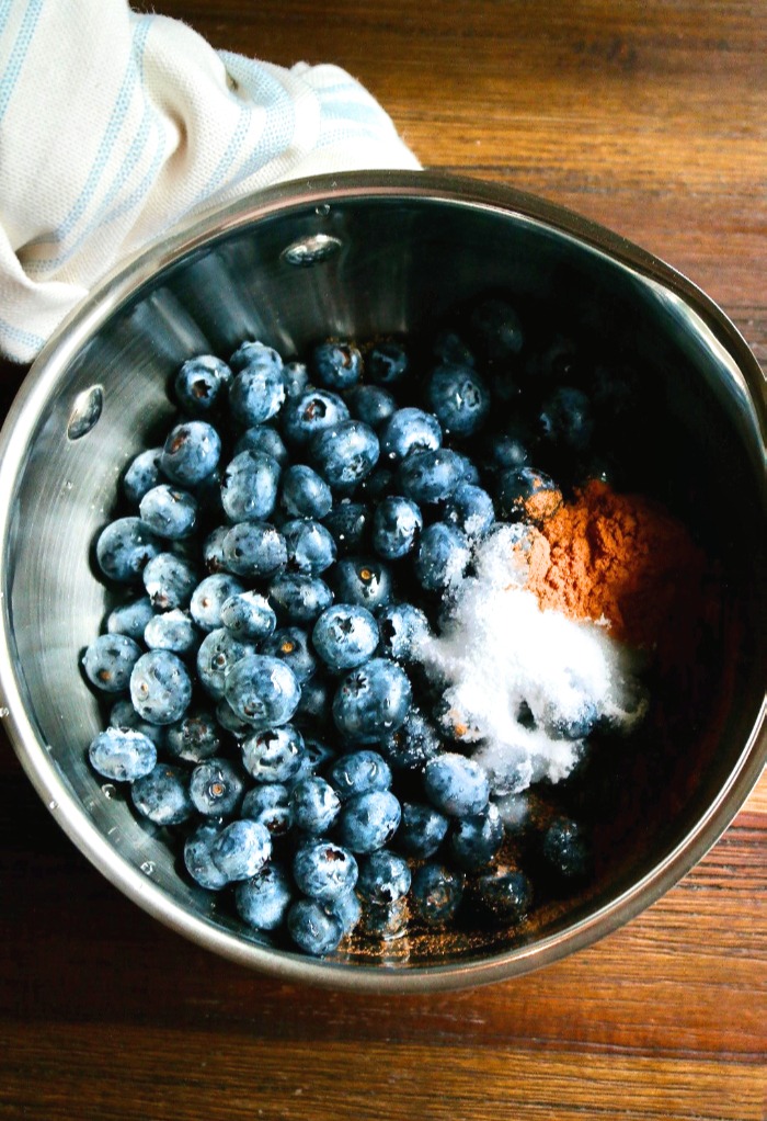 Blueberries in a saucepan with cinnamon