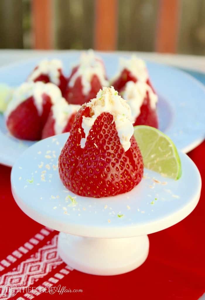 Cheesecake Stuffed Strawberries with coconut and lime flavors for a tropical twist! Low-carb treats are the perfect finger dessert! The Foodie Affair