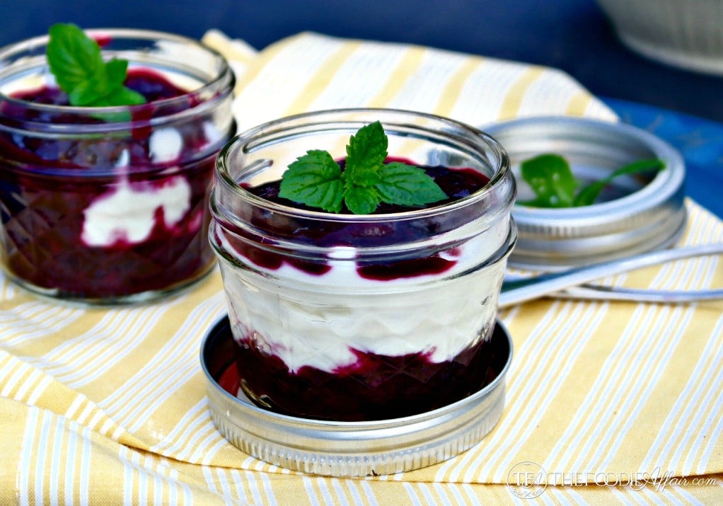 sugar free blueberry sauce in small mason jars with yogurt
