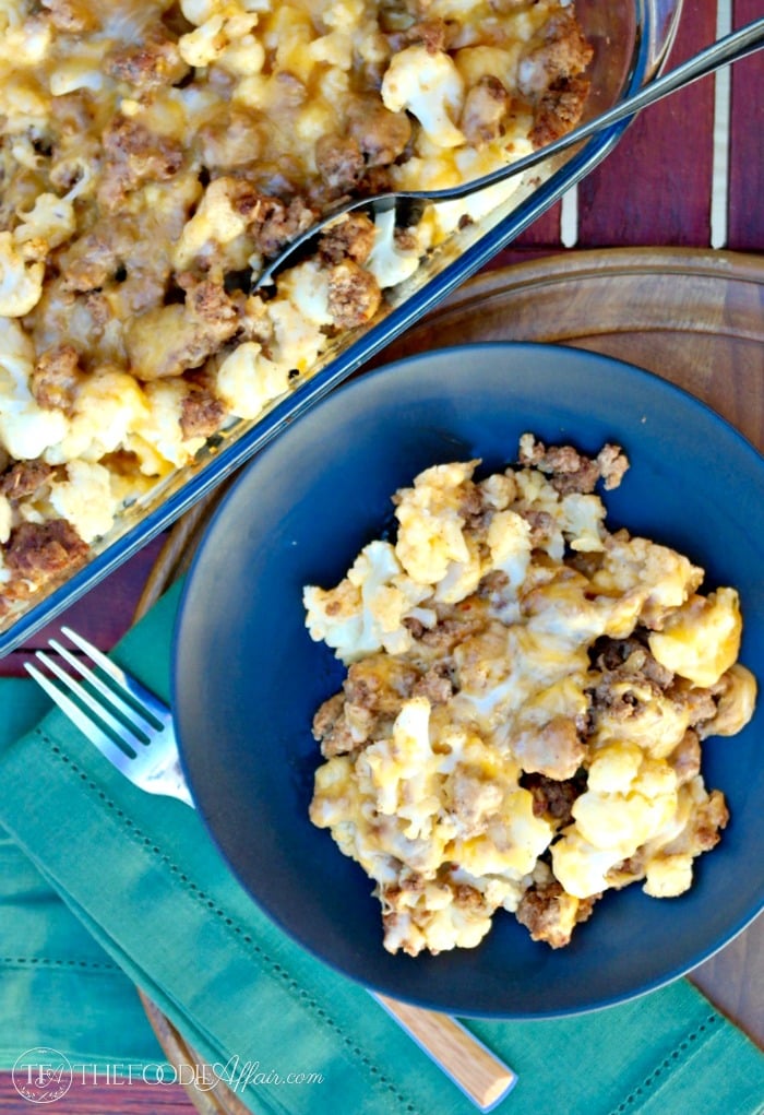 Low Carb Hamburger Casserole made with cauliflower instead of pasta and seasoned with taco spices, and then baked with cheddar cheese!