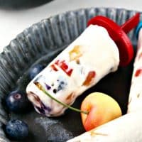 Protein Ice Cream recipe with fresh fruit on a tin tray