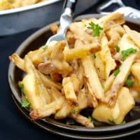 poutine gravy fries on a brown plate