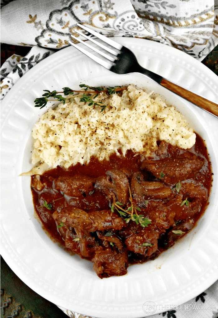 Slow cooked sirloin tips with mushrooms and onions simmered in wine. 