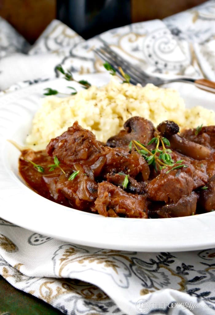 Slow cooked sirloin tips with mushrooms and onions simmered in wine. 