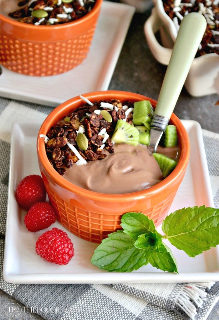 Chocolate coconut granola with pumpkin seeds, carob nibs and coconut flakes #granola #yogurt | thefoodieaffair.com