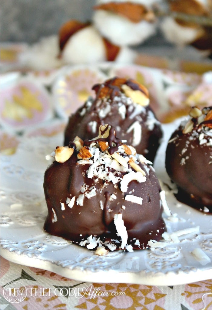 Low carb chocolate covered cookies made with superfine almond flour and coconut flakes #glutenfree #cookies #lowcarb | thefoodieaffair.com