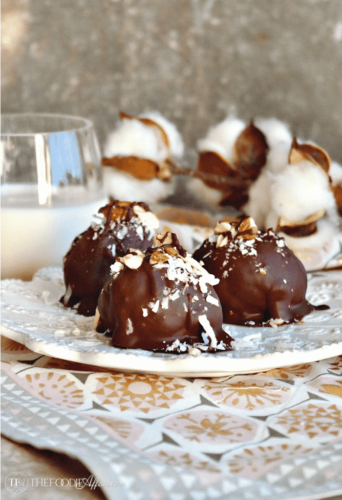 Low carb chocolate covered cookies made with superfine almond flour and coconut flakes #glutenfree #cookies #lowcarb | thefoodieaffair.com