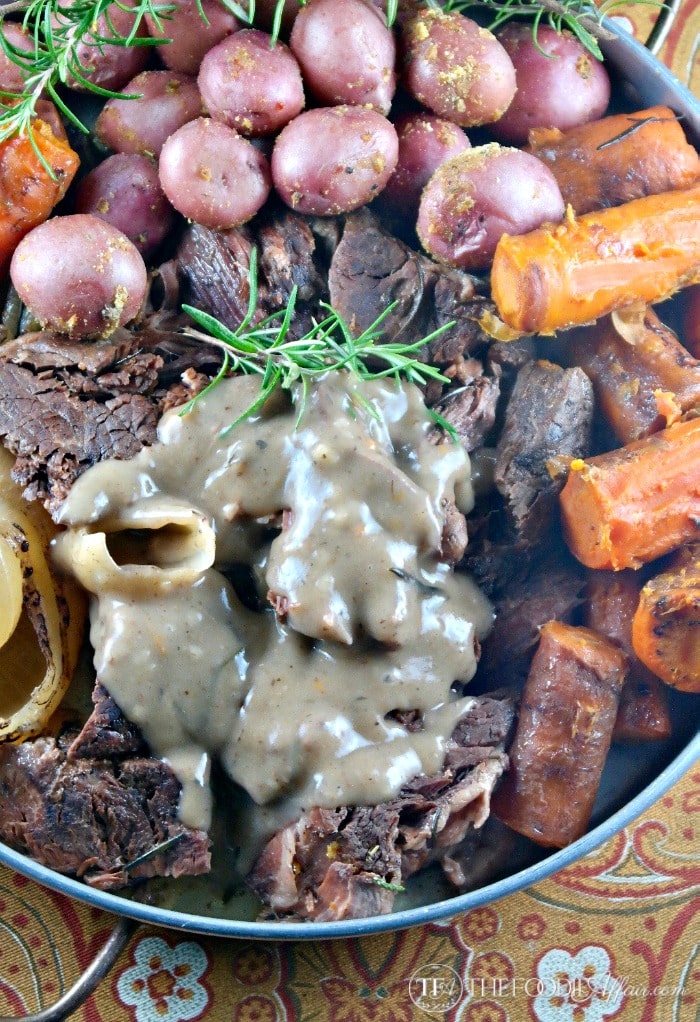 Simple Slow Cooker Pot Roast with a creamy gravy sauce #slowcooker #crockpot #potroast #roast | www.thefoodieaffair.com