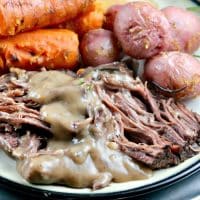 Simple Slow Cooker Pot Roast with a creamy gravy sauce #slowcooker #crockpot #potroast #roast | www.thefoodieaffair.com