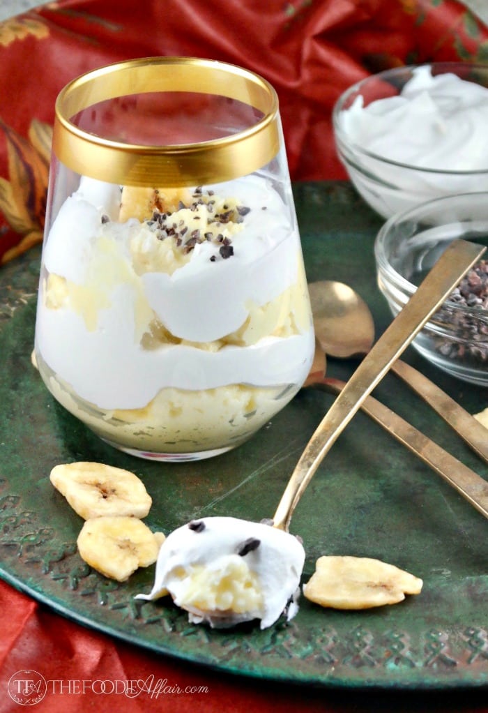 Banana Cream Parfaits in a clear dish with gold rim
