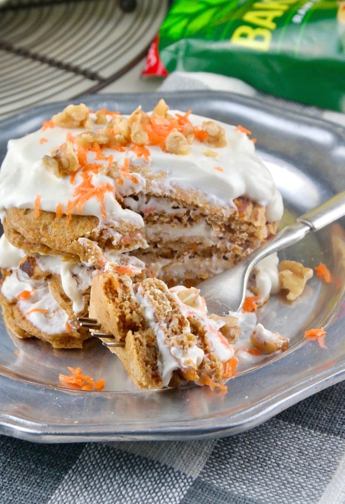 pancakes with yogurt topping on a tin plate