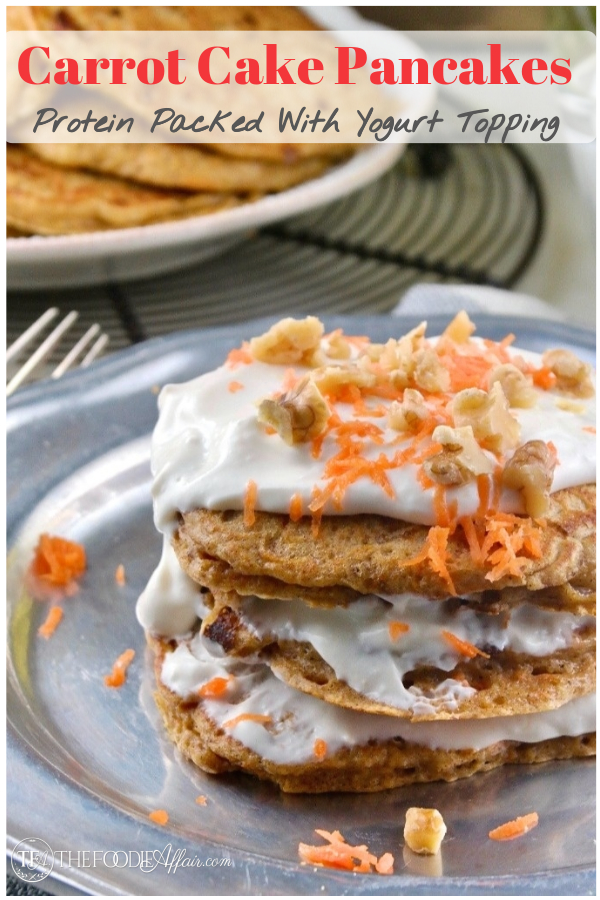 Carrot Cake Protein Pancakes topped with honey yogurt cream cheese! These pancakes are made with a secret ingredient sure to keep you satisfied for hours! #pancake #protein #brunch #Easterrecipe #thefoodieaffair #carrotcake