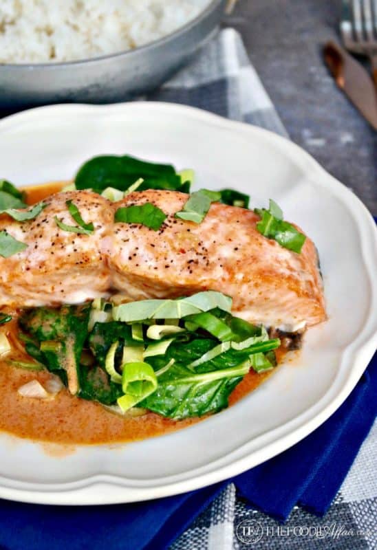 Salmon Coconut Curry Sauce over Sautéed Spinach | The Foodie Affair