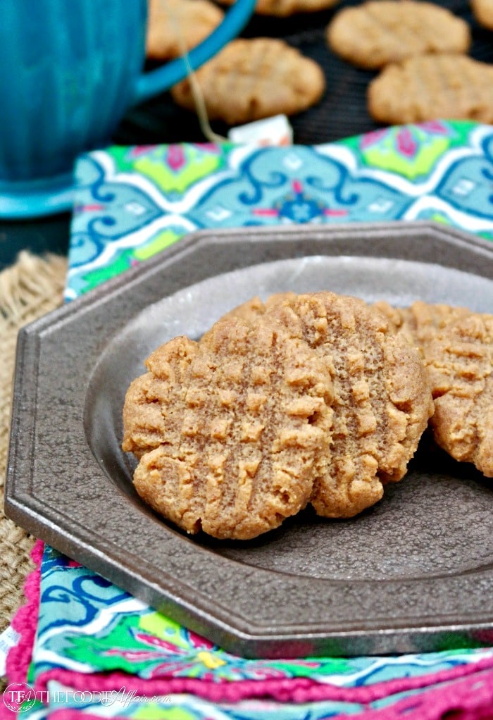 Simple sugar free peanut butter cookies on a plate tan plate with colorful napkin