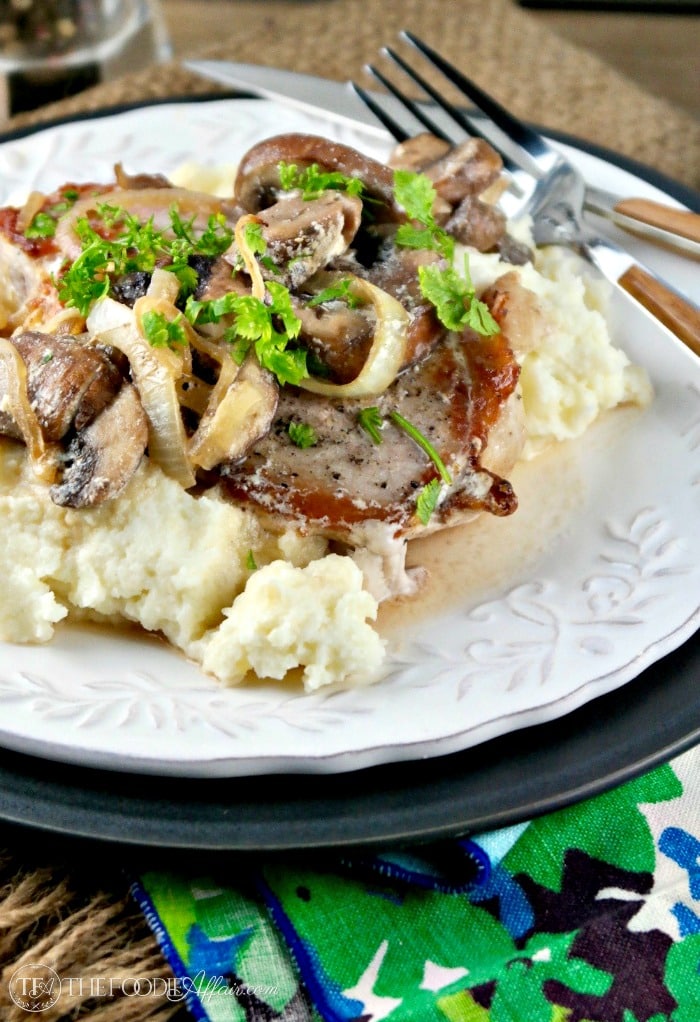Pork Chops Mushroom Cream Sauce with onions and heavy cream. This flavorful skillet meal is ready in under 30 minutes. #pork #skillet #mushrooms #lowcarb | www.thefoodieaffair.com