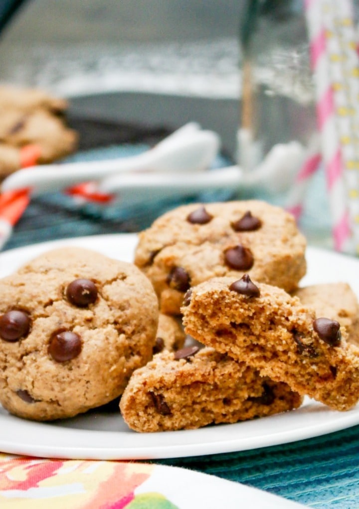 Gluten free almond butter cookies on a white serving plate. 