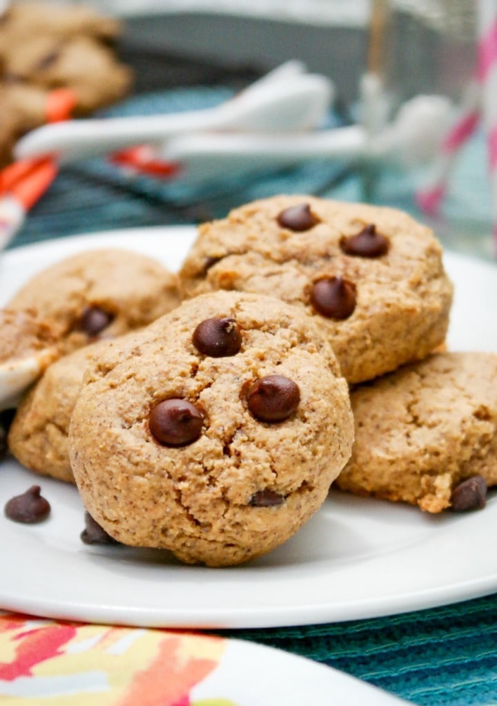 Keto almond butter cookies with chocolate chips on a white plate. 