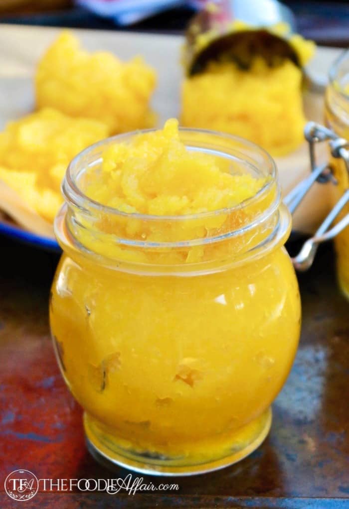 Fresh pumpkin puree in a glass jar.