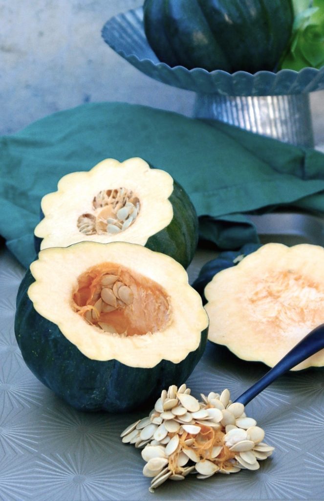 acorn squash cut and cleaned of the seeds in preparation for cooking 