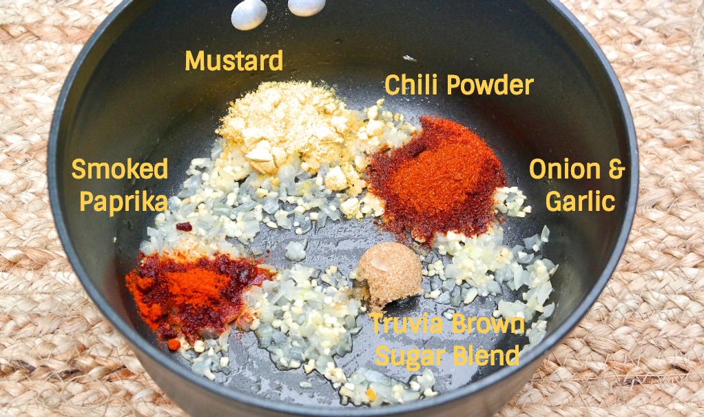 spices for low carb bbq sauce in a black pan