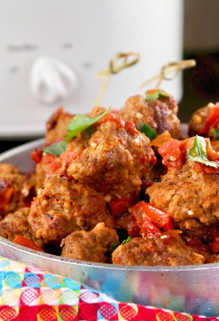 Mexican-style slow cooked meatballs in a silver serving dish