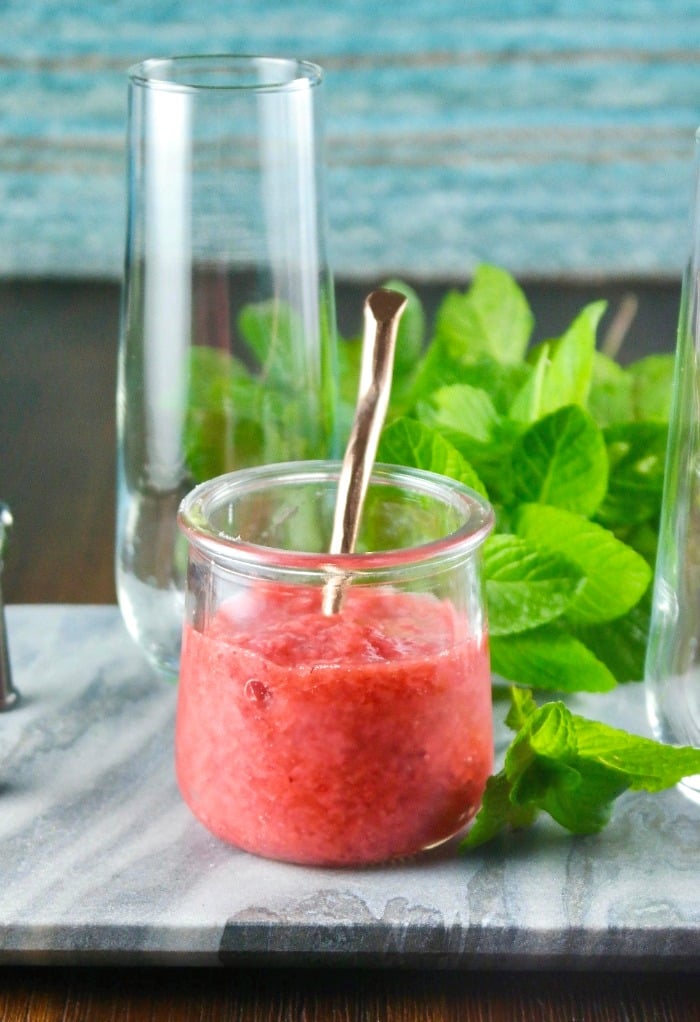 Strawberry puree in a glass jar for strawberry mojito cocktails