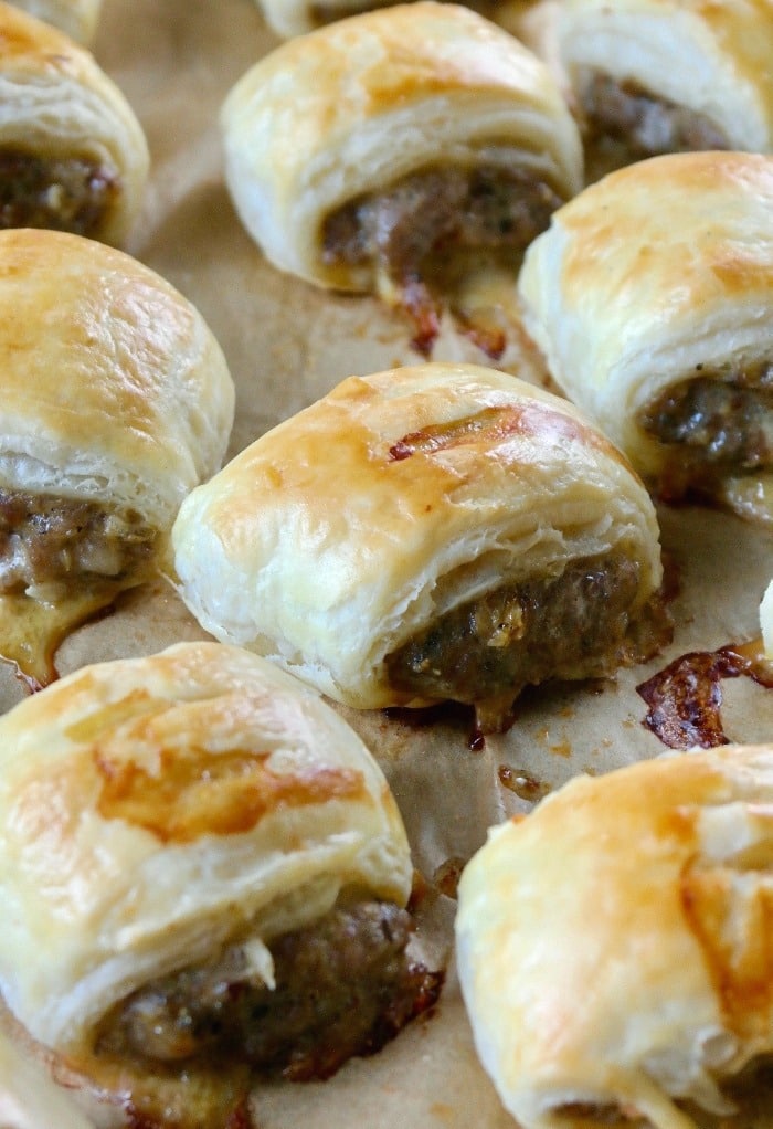 Sausage roll recipe on a baking sheet freshly cooked