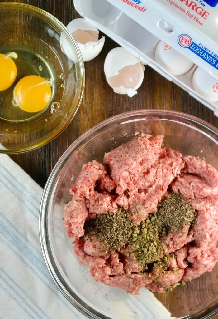 ingredients for sausage roll recipe in a clear bowl