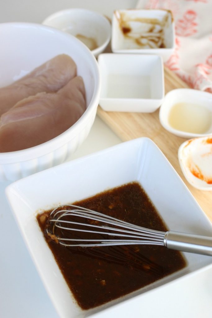 Ingredients whisked together for an Asian chicken marinade.