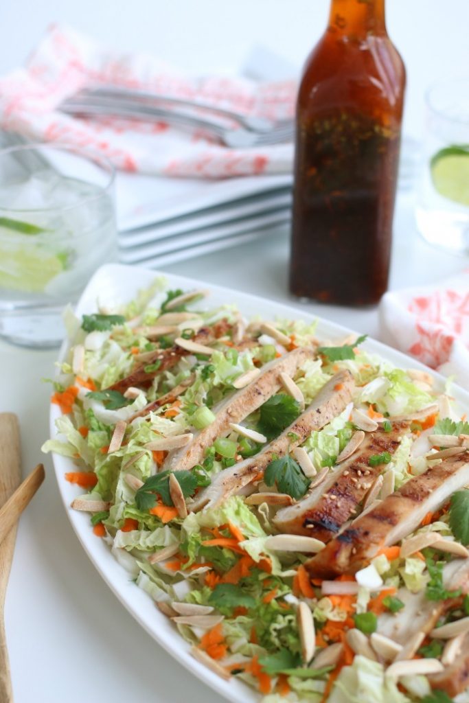 Delicious Asian inspired grilled chicken salad on a serving platter.