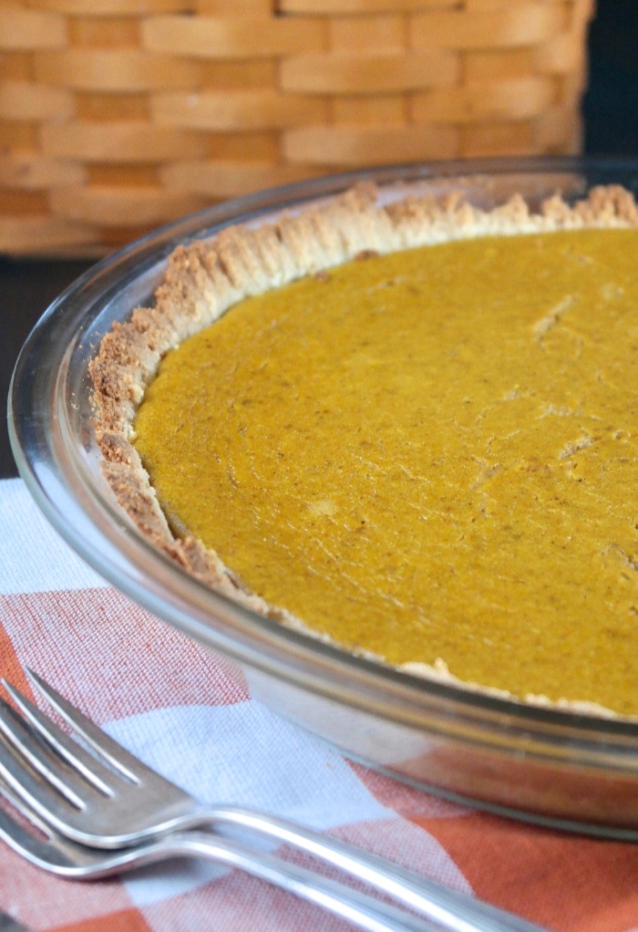 gluten free pumpkin pie in a clear pie dish