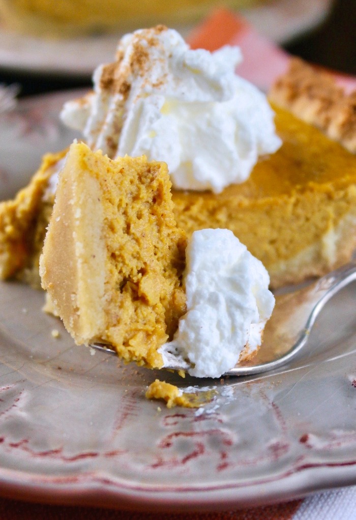 slice of low carb pumpkin pie with whipped cream 