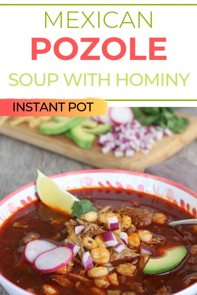 Pozole Mexican soup with hominy topped with radish and avocado.