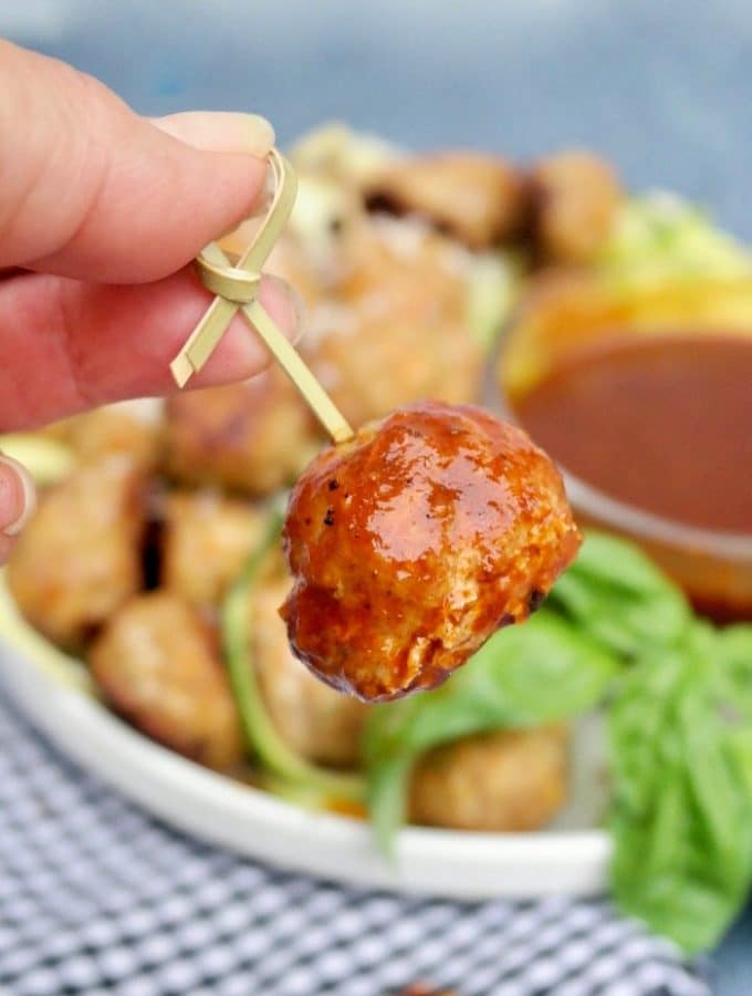 Turkey meatball dipped in sauce