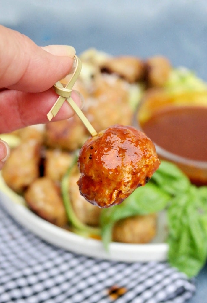 Turkey meatball dipped in sauce