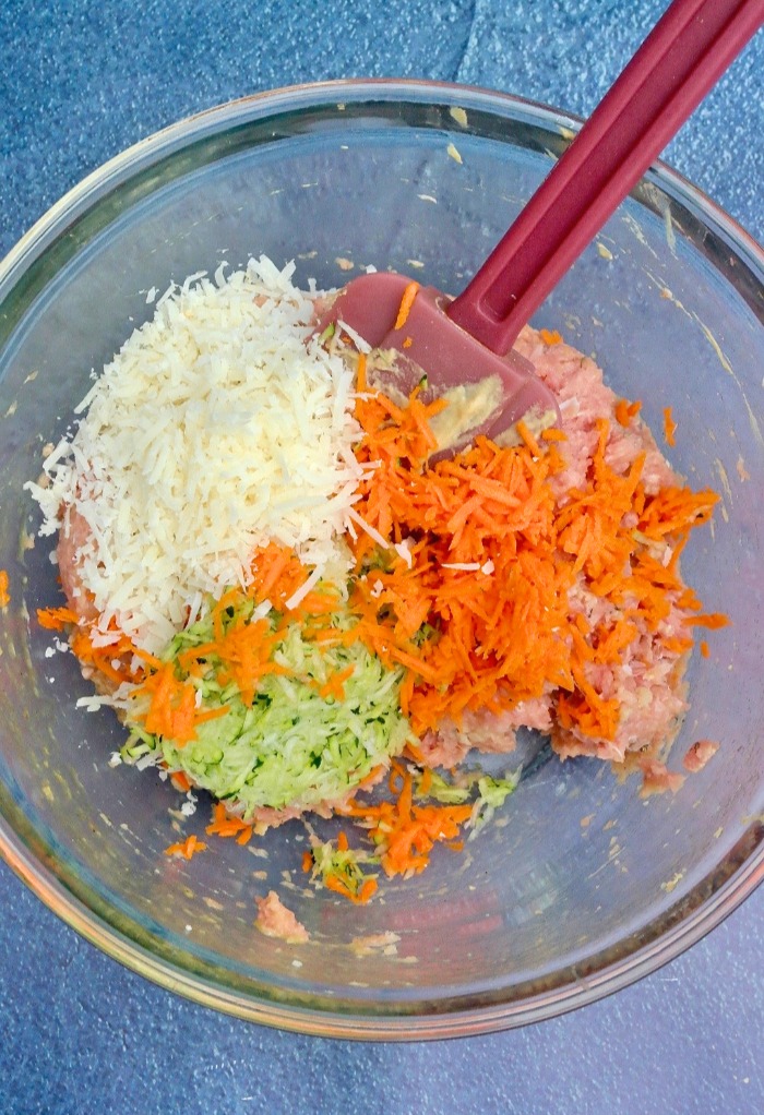Shredded carrots and zucchini added to turkey meat for healthy turkey meatball recipe..