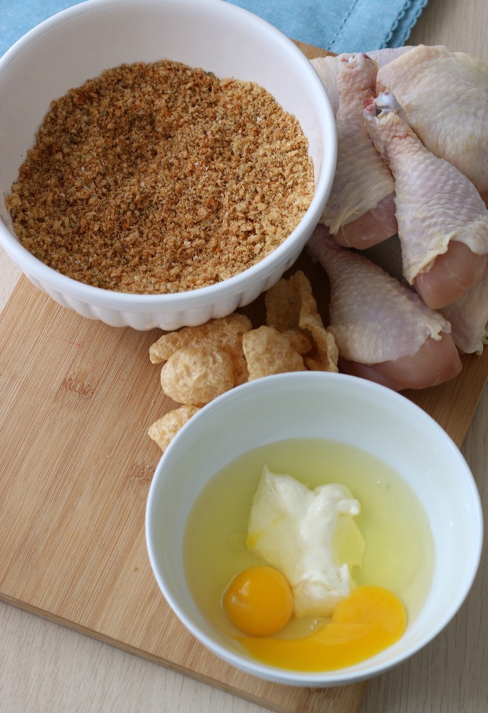 Next we make the wet mixture for keto fried chicken using pork rinds. 
