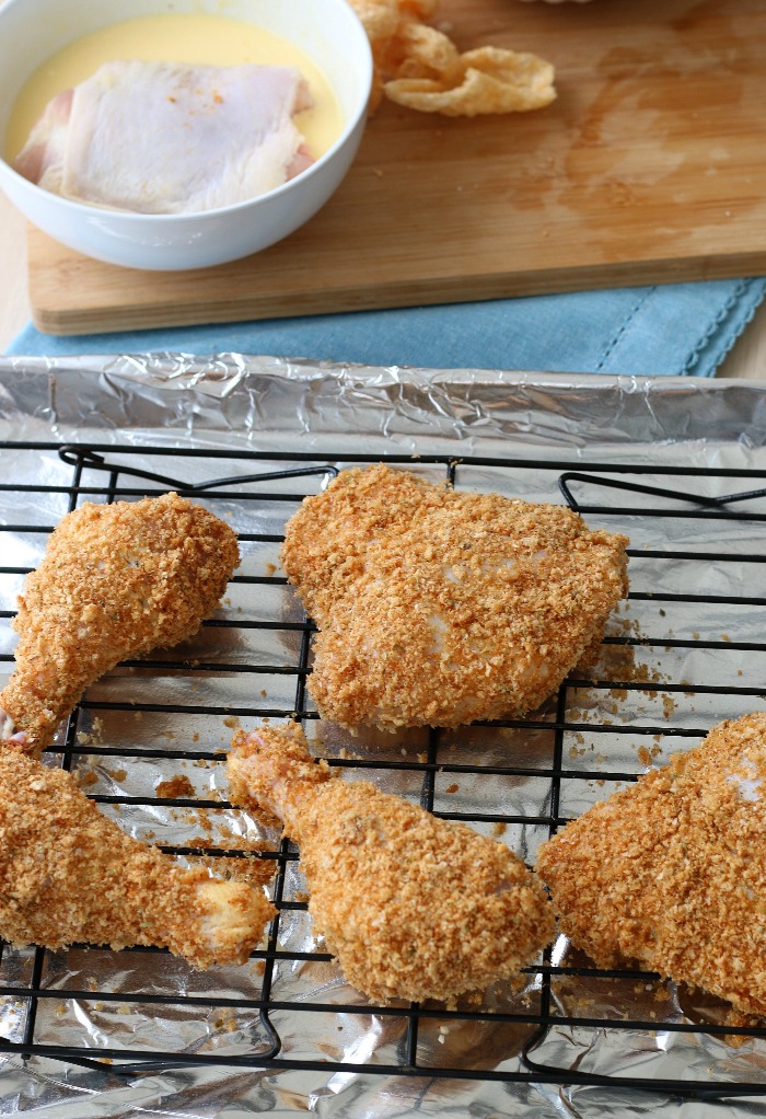 Now the keto fried chicken using pork rinds is ready for the oven!