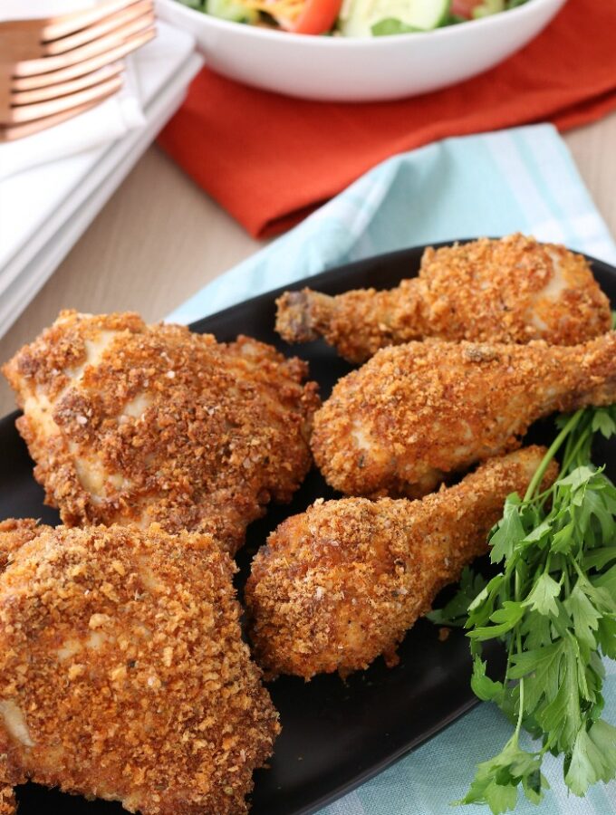 A plate of the keto fried chicken using pork rinds served up and ready to be enjoyed.