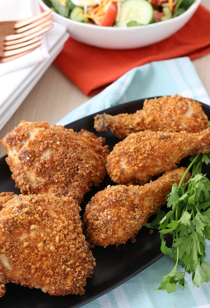 A plate of the keto fried chicken using pork rinds served up and ready to be enjoyed.