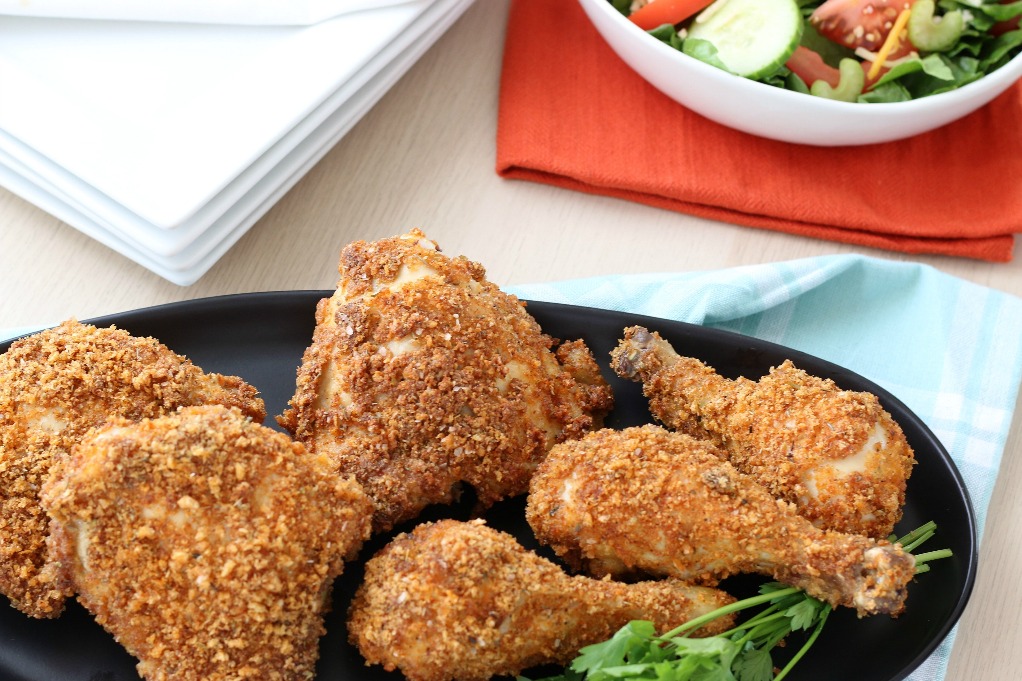 Horizontal shot of the finished keto fried chicken, using pork rinds on keto is easy and delicious! 