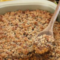 Finished sweet potato casserole easy version with a scoop out of it, ready to be served and enjoyed.