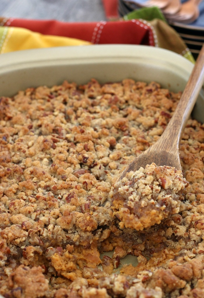 Finished sweet potato casserole easy version with a scoop out of it, ready to be served and enjoyed.