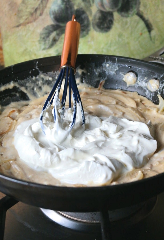 Add sour cream to sauce before folding in green beans.