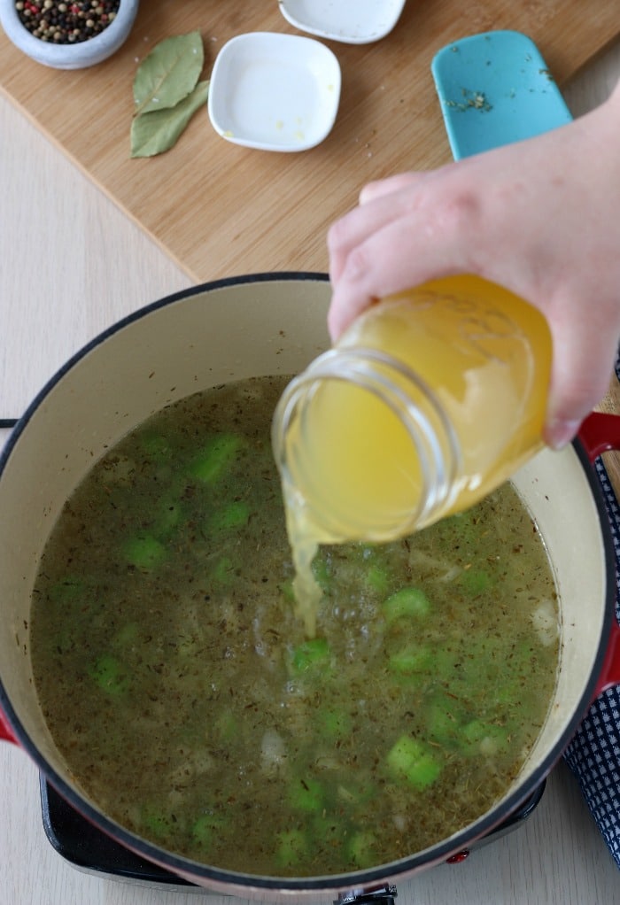 Adding the stock is an important step for any good chicken soup recipe!