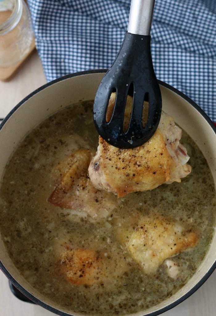 Now we see the chicken thighs being added back into the pot for low carb chicken soup.