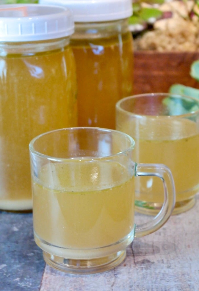 Clear glass cup of broth made in an Instant Pot