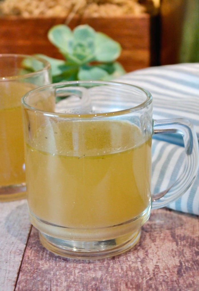 Clear cup of bone broth made in an Instant Pot